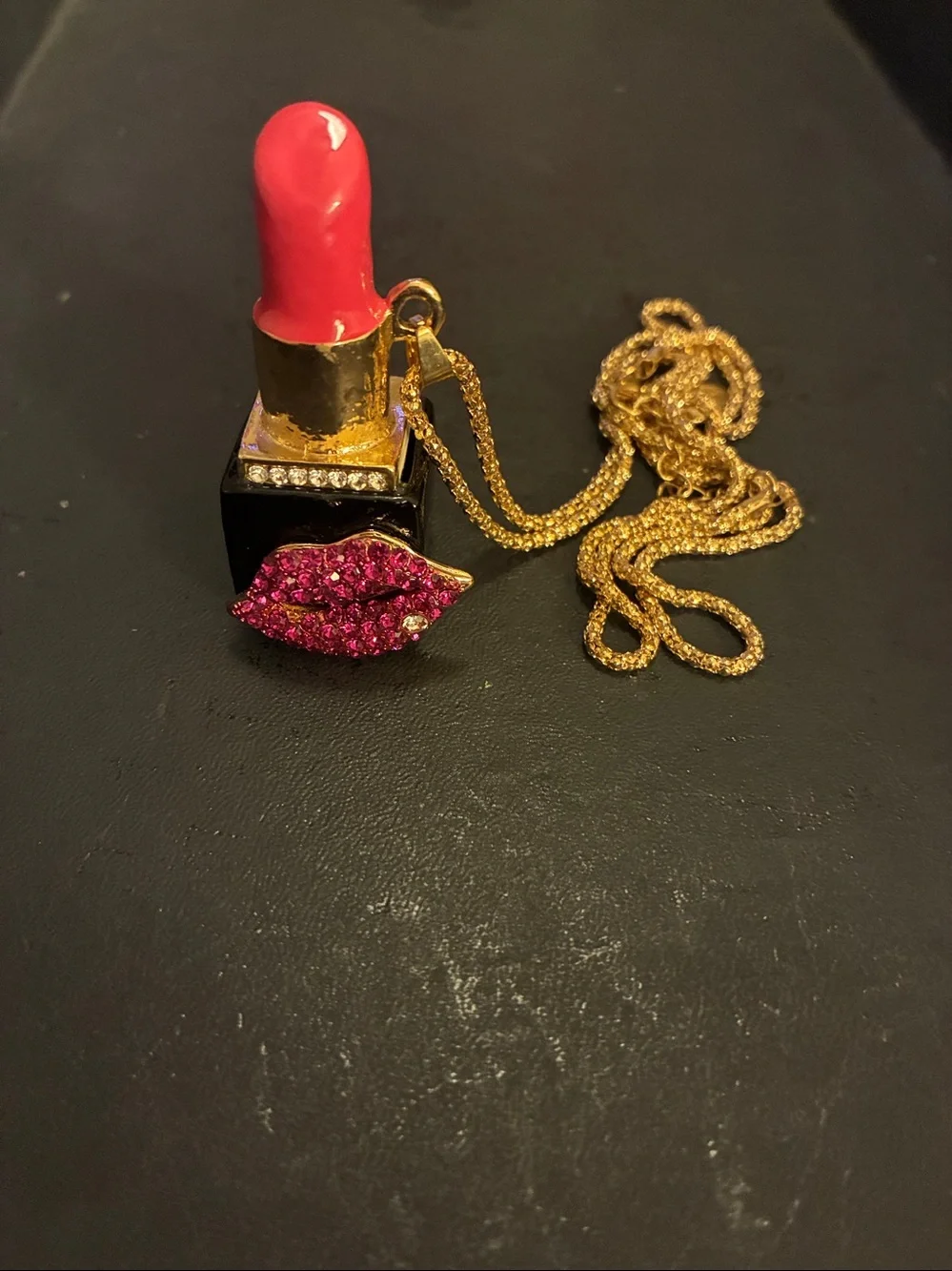 Pink Lipstick Pendant with crystal red lips. White crystal on the bottom lip